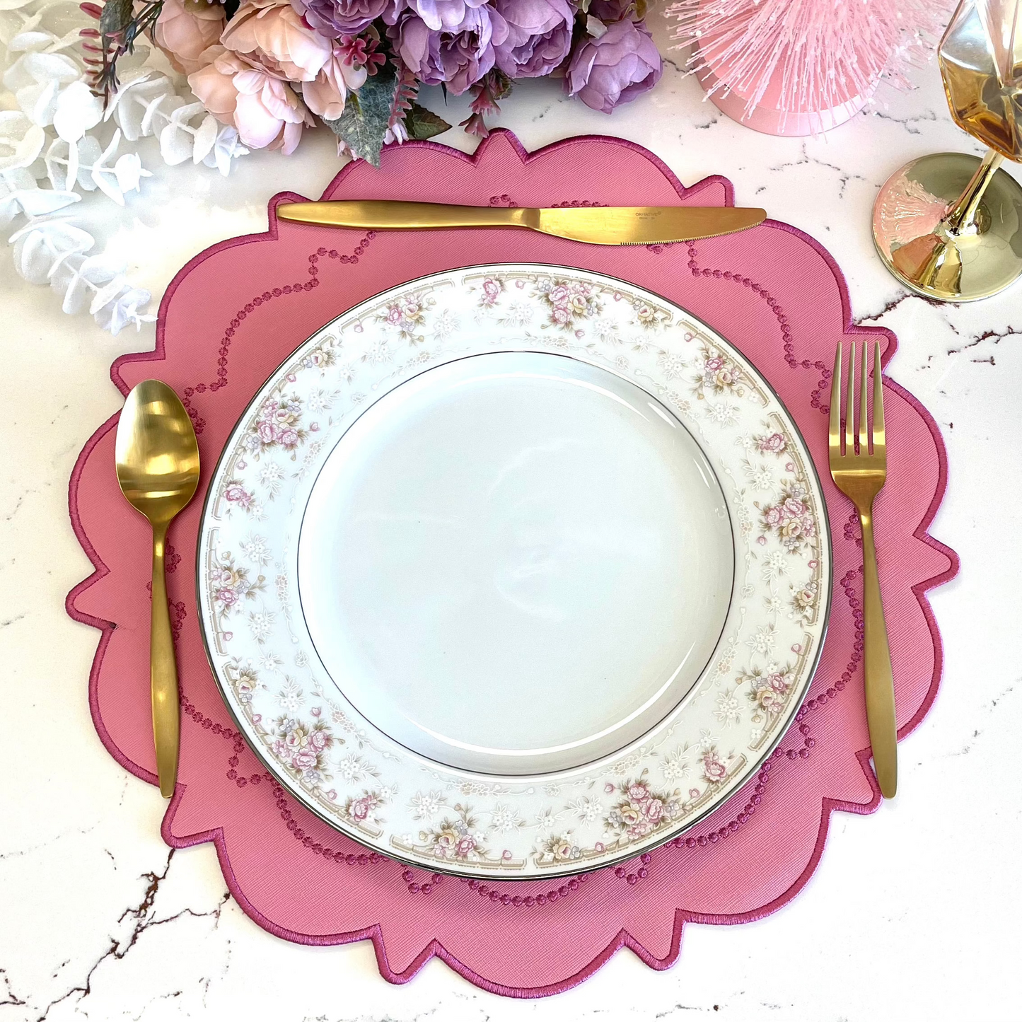 Elevate your dining with the Solstice Pink Dark Pink Faux Leather Placemat. Waterproof, stylish, and durable, these placemats are ideal for special occasions, weddings, and table settings