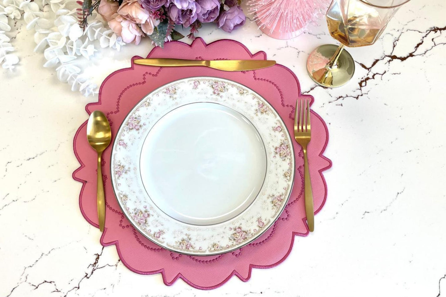 Elevate your dining with the Solstice Pink Dark Pink Faux Leather Placemat. Waterproof, stylish, and durable, these placemats are ideal for special occasions, weddings, and table settings