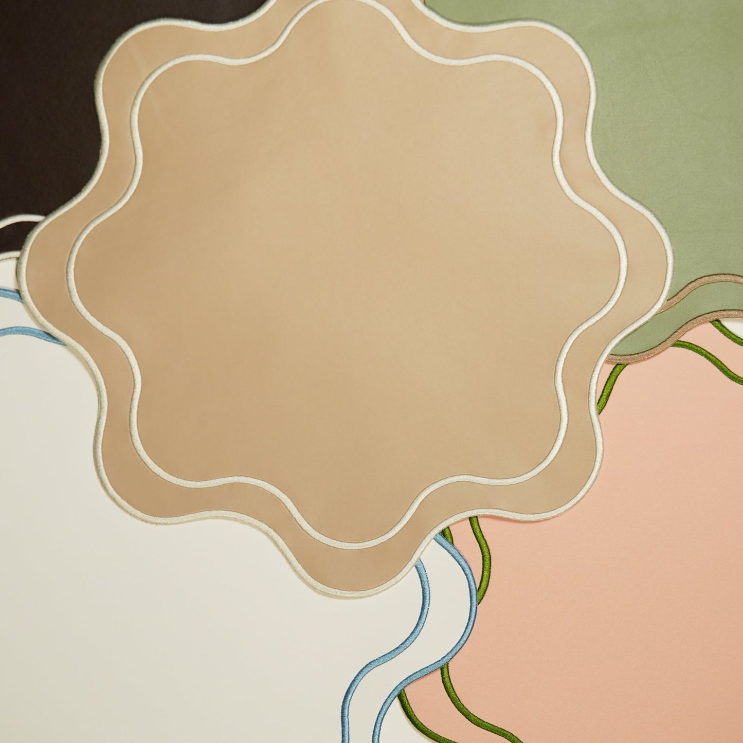 Haven Burgundy Wavy Edge Faux Leather Placemat – close-up view showing the intricate embroidery, double-layer stitching, and premium vegan faux leather texture.