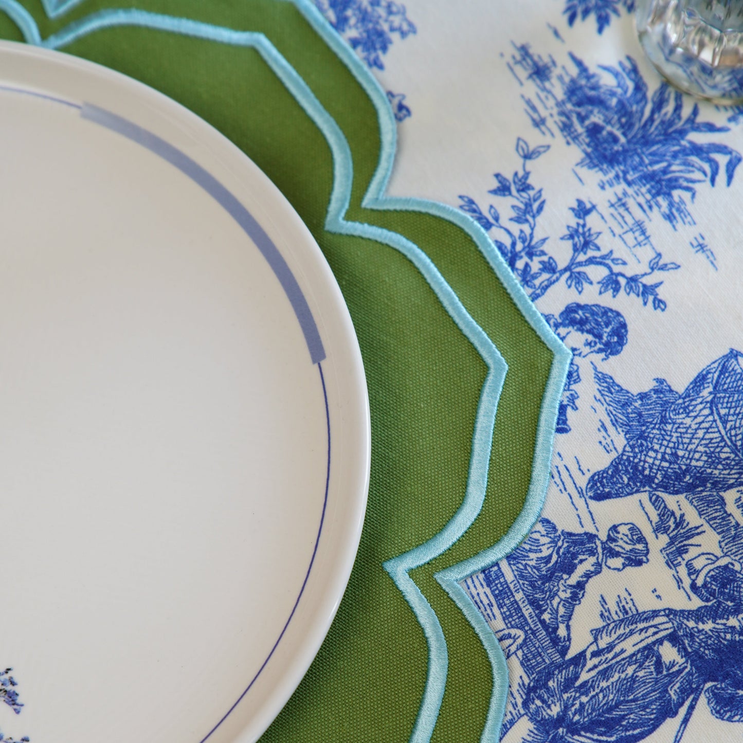 Eco-friendly embroidered fabric placemat featuring intricate stitching, a must-have for stylish table decor, made to order with USA delivery.