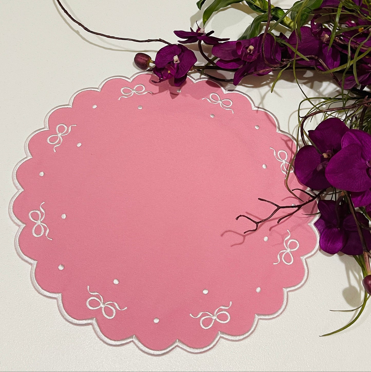 Sustainable and handmade embroidered table mat featuring intricate stitching, suitable for luxury dining and everyday use, made to order with USA delivery.