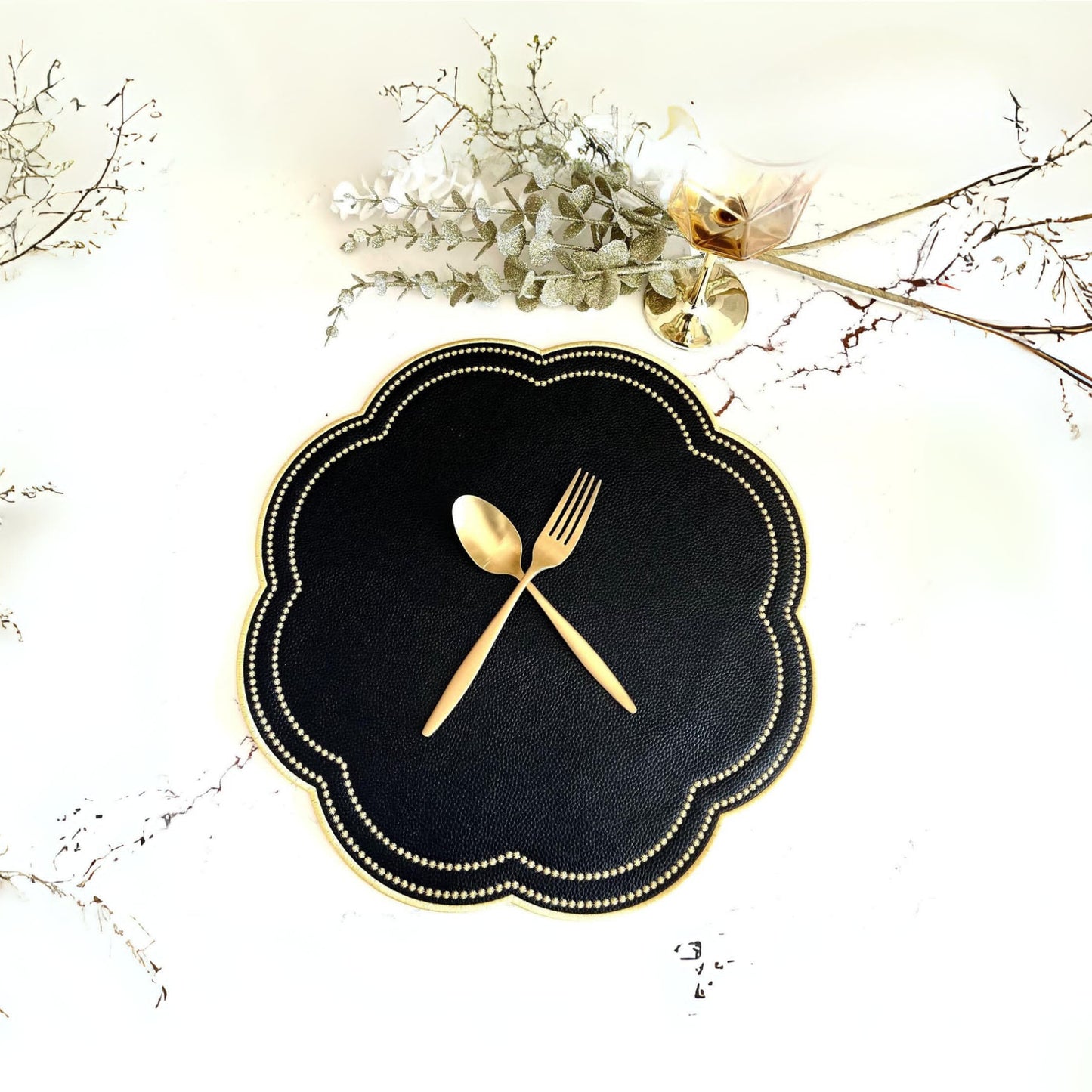 Nurture Black Gold Round Faux Leather Placemat – expertly handcrafted from eco-friendly, vegan faux leather with elegant embroidery and double-layered design, stain-resistant and durable. Exclusively by PNR Decor.