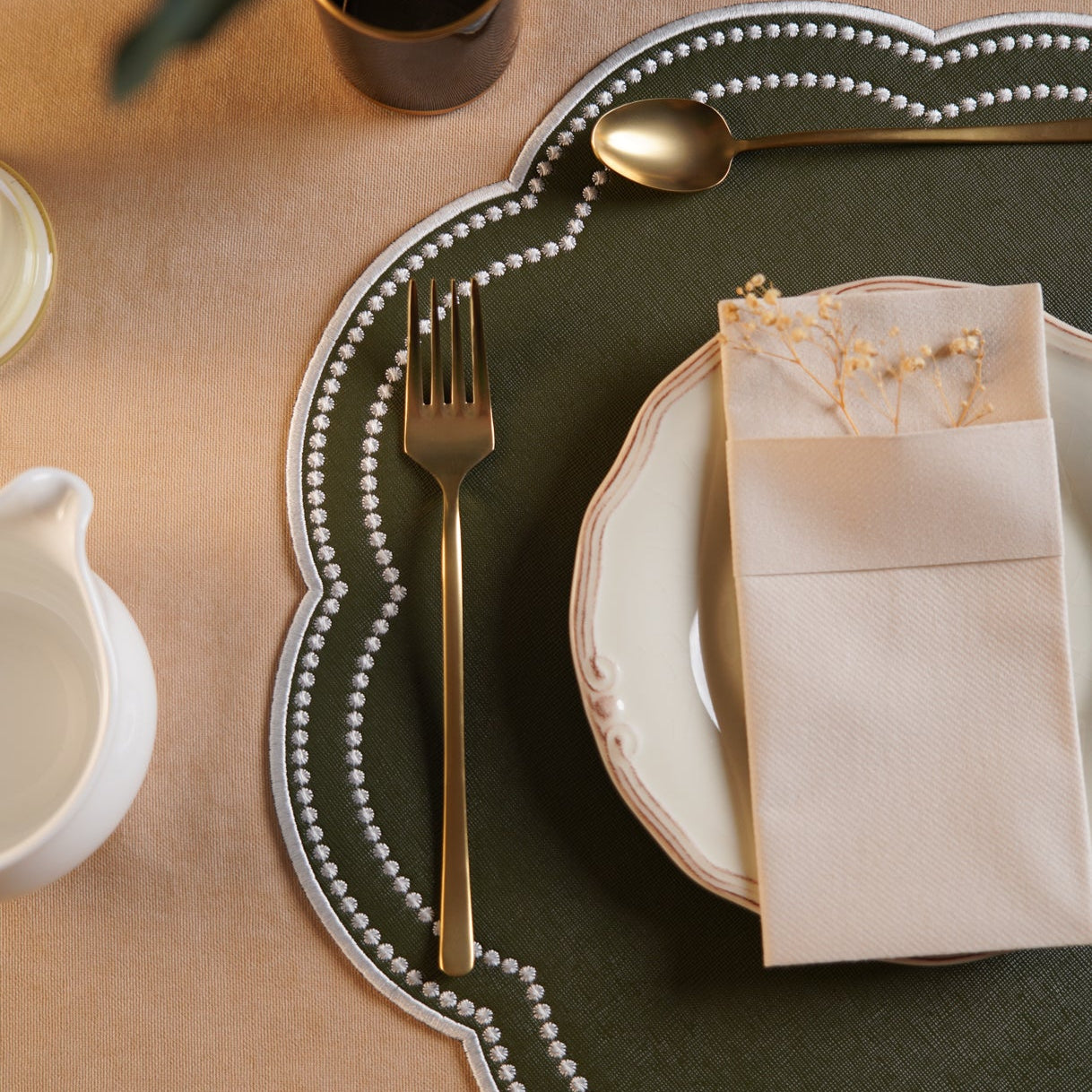 Nurture Green Round Faux Leather Placemat – perfect for weddings, formal dining, or special events — a luxury placemat made from eco-conscious vegan leather. Exclusively by PNR Decor.