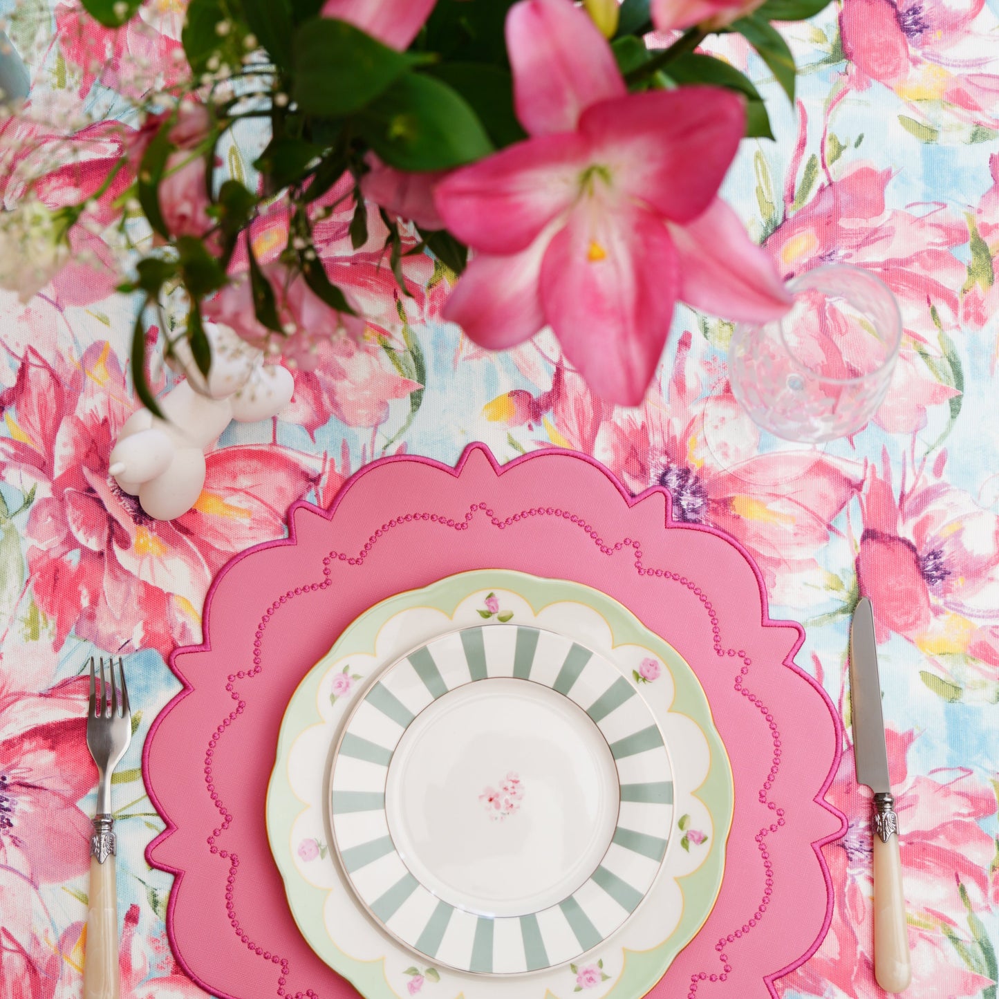 Pink floral rectangular tablecloth styled for everyday dining, brunch, or special celebrations