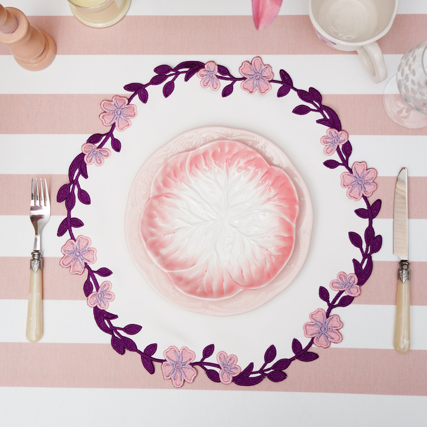 White & Purple Round Dining Placemat – Meticulously handmade with eco-conscious faux leather, designed to elevate your table with embroidered accents and superior stain resistance.
