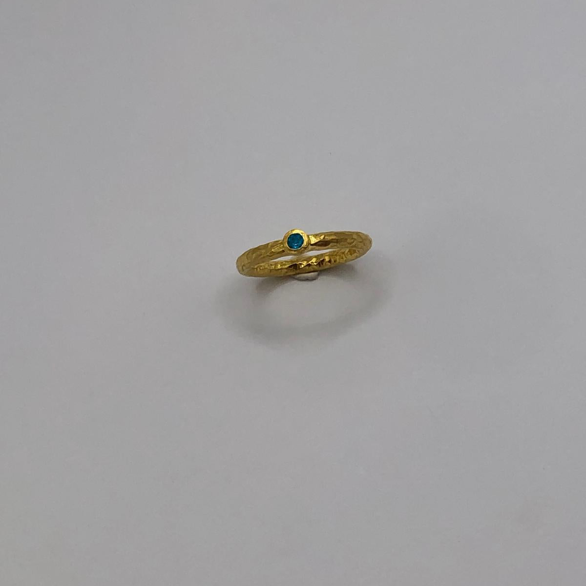 A dainty, nature-inspired textured band ring crafted from authentic 925 sterling silver with a radiant gold finish, size 6, displayed on a clean background.