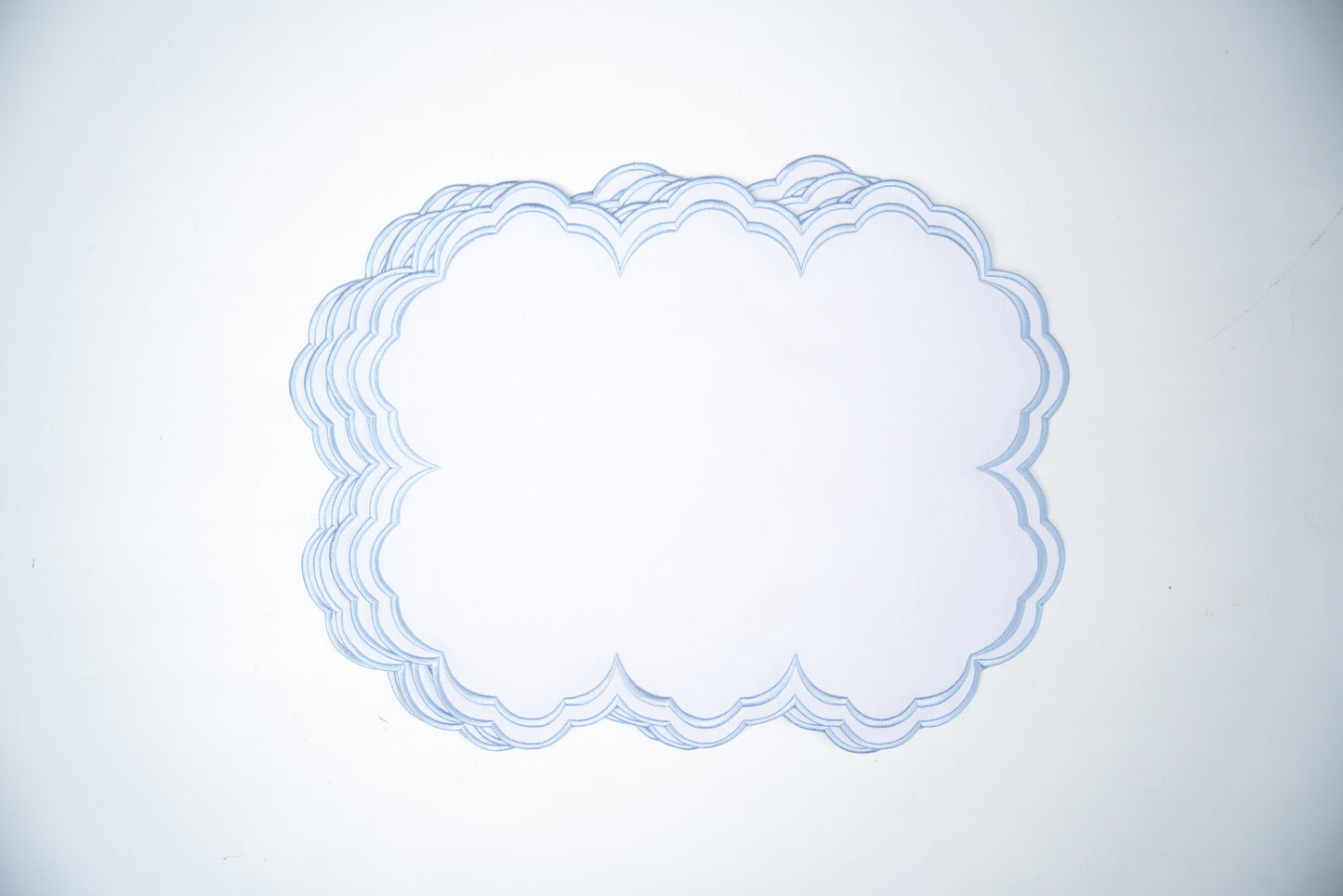 AQUELLE WHITE BLUE TRIM FABRIC PLACEMAT