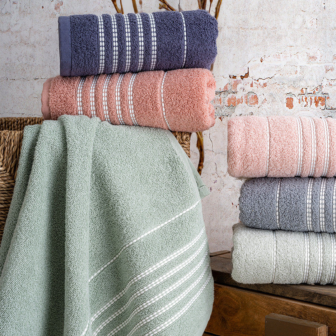 Close up of Fluffra premium hand towels showing embroidered detail and cotton texture by PNRDECOR ship from USA