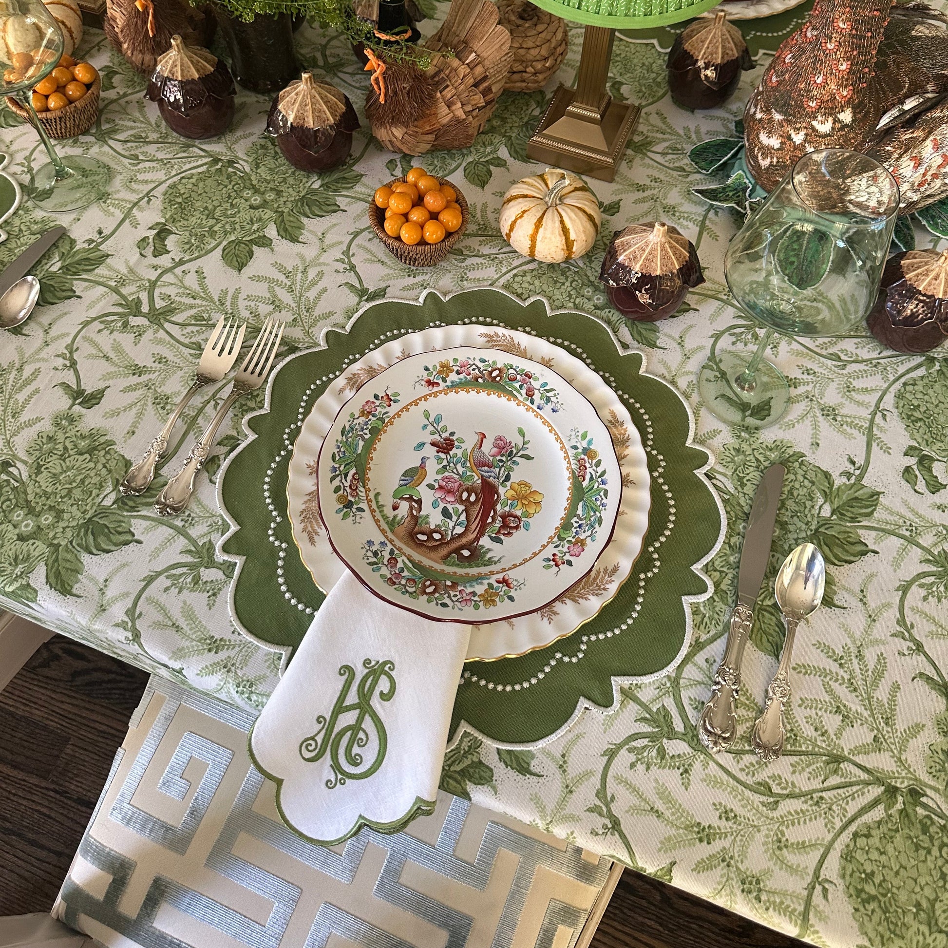 Eco-friendly embroidered green placemat with matching napkin, washable and waterproof – elevate your table setup with the Harmony bundle. Fast U.S. shipping.