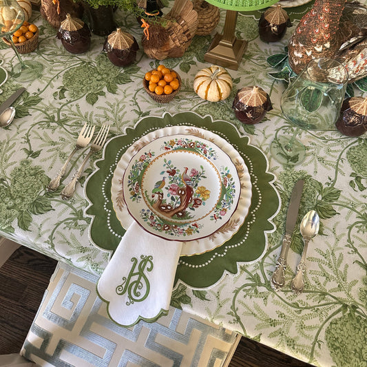 Eco-friendly embroidered green placemat with matching napkin, washable and waterproof – elevate your table setup with the Harmony bundle. Fast U.S. shipping.