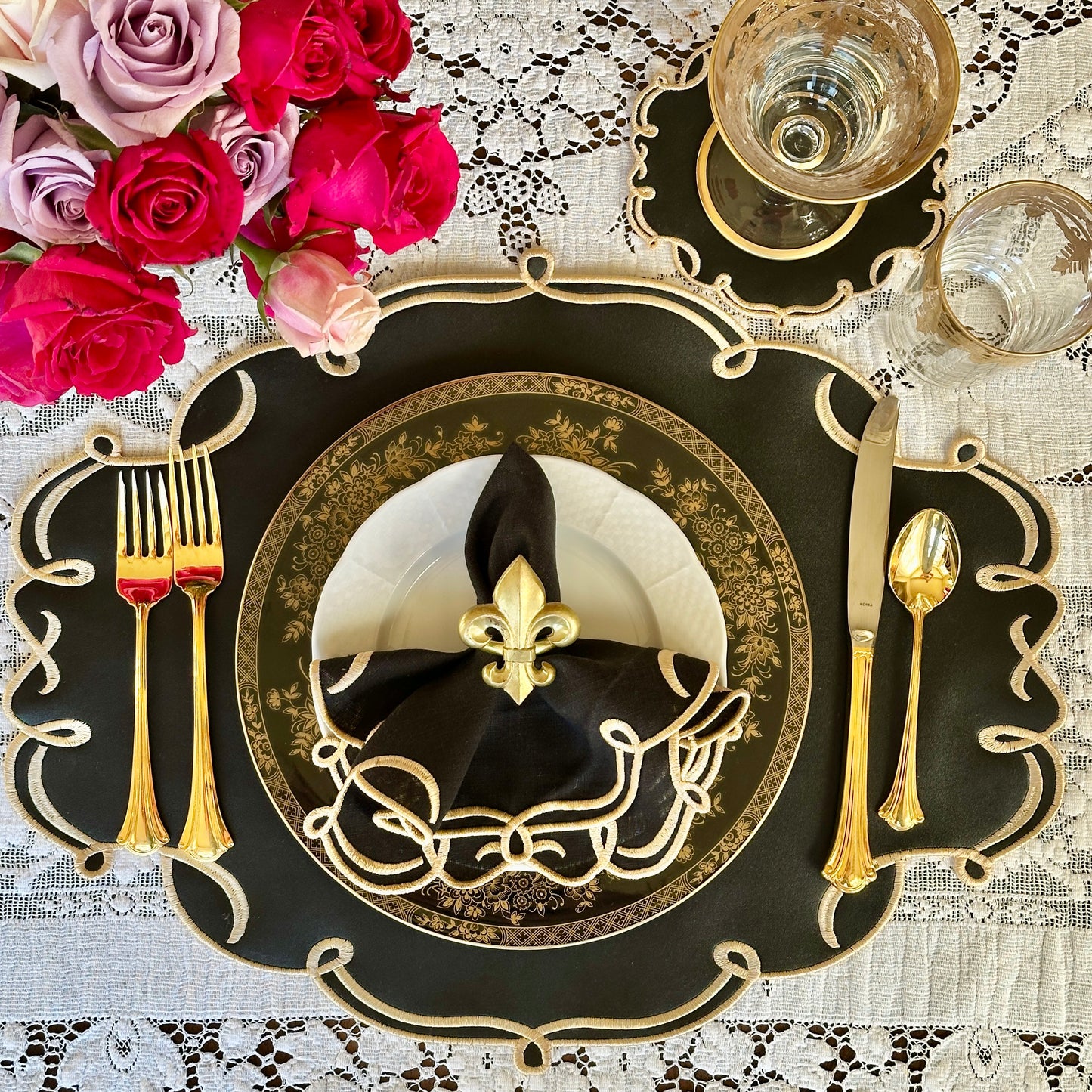 CELESTIA BLACK FAUX LEATHER PLACEMAT AND COASTER SET