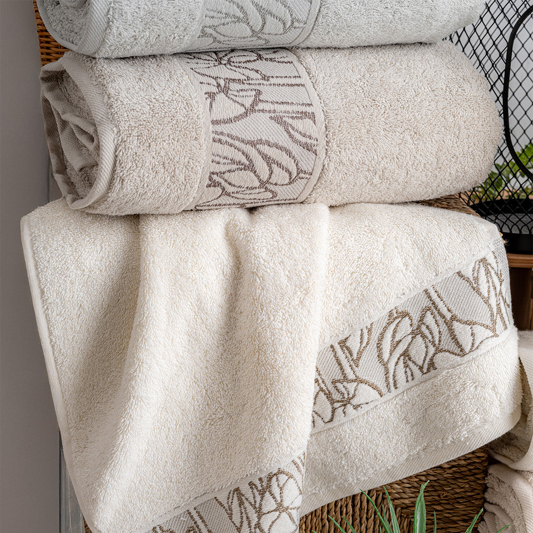 Close up of Lavaya Garden towels showing embroidered detail and soft fabric texture by PNRDECOR ship from USA