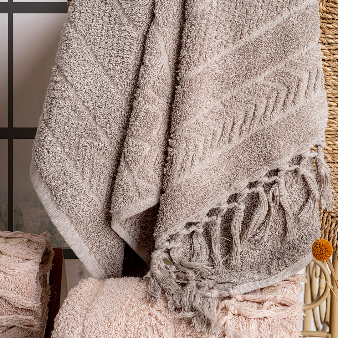 Close up of Lavaya Hilda towels showing embroidered detail and soft fabric texture by PNRDECOR ship from USA