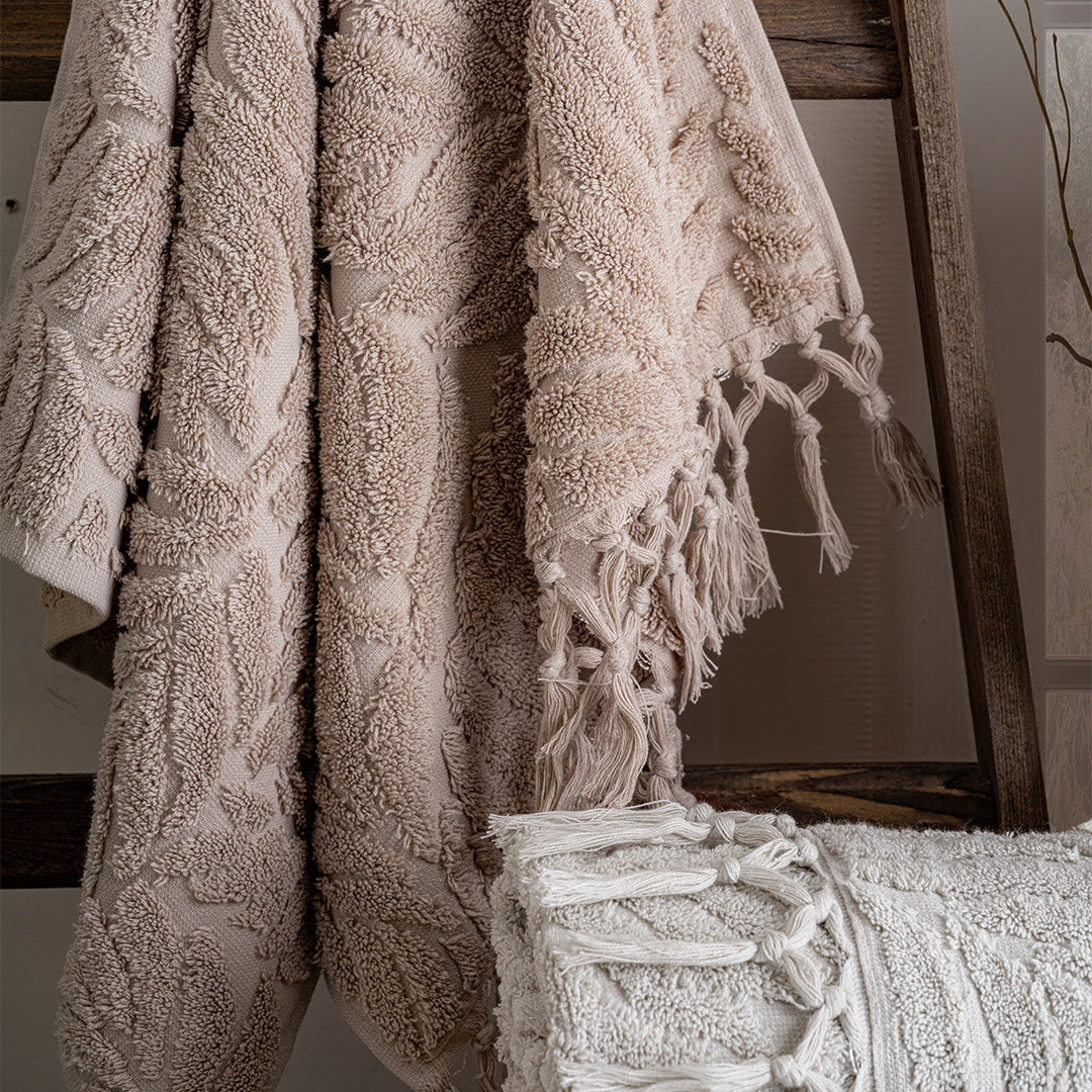 Close up of Lavaya Merlin towels showing embroidered detail and soft fabric texture by PNRDECOR ship from USA