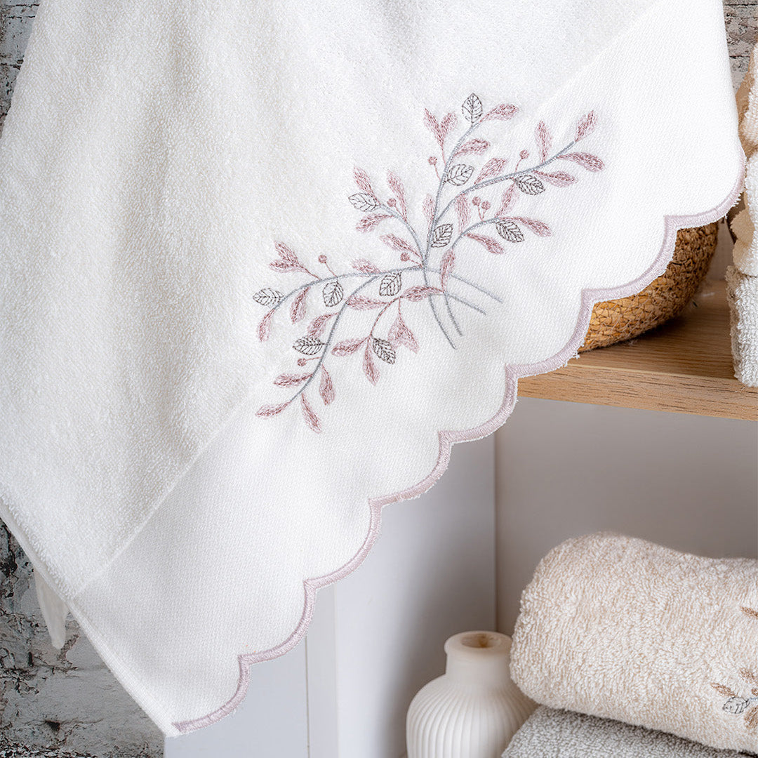 Close up of Mollis cotton towels showing embroidered detail and soft cotton texture by PNRDECOR ship from USA