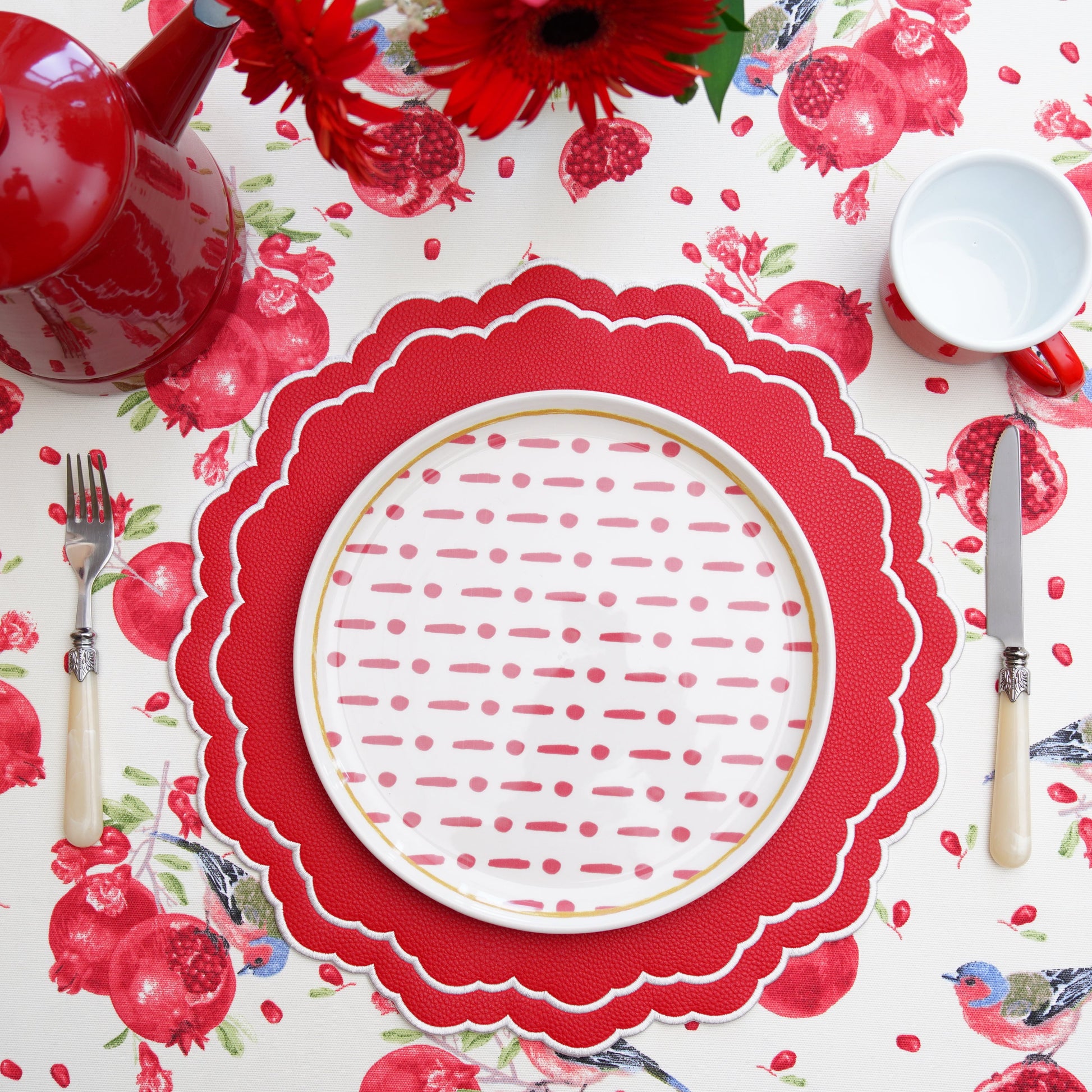Scarlett Red Round Faux Leather Placemat – Luxuriously styled for sophisticated tables, expertly handcrafted from cruelty-free vegan leather with refined embroidery and an easy-to-clean surface. Exclusively by PNR Decor.