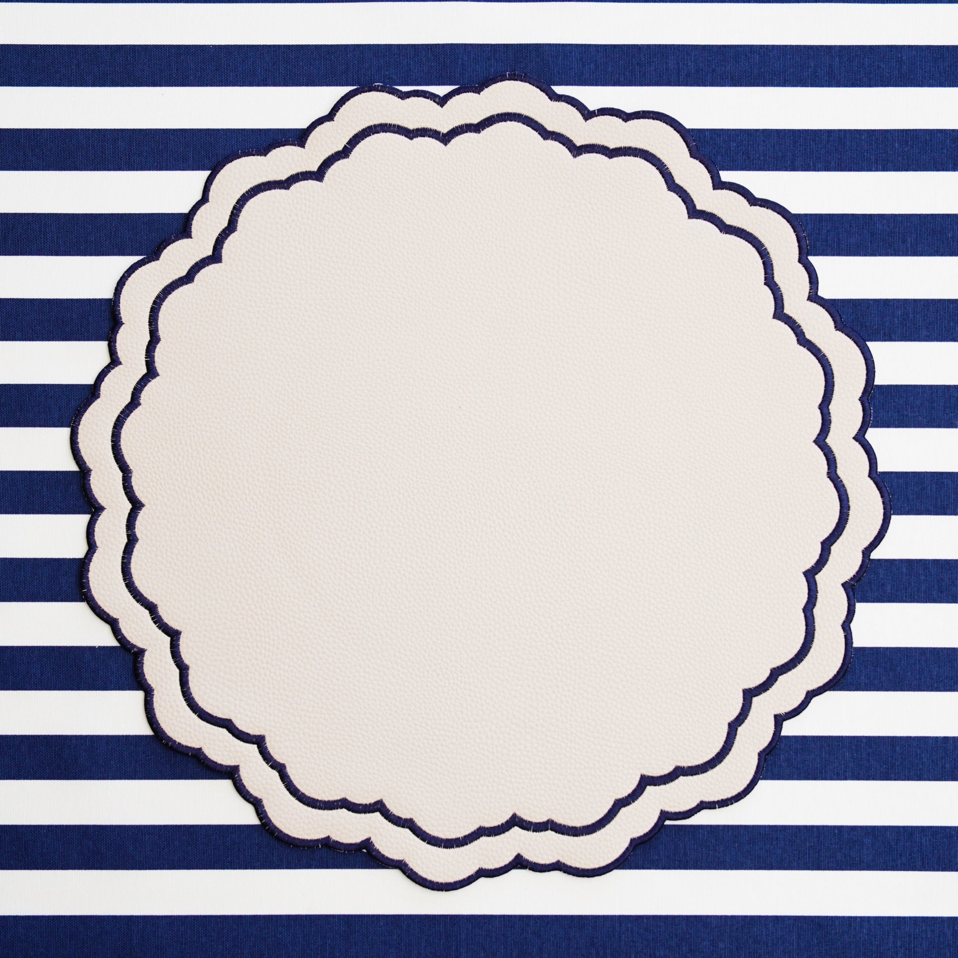 Scarlett White Navy Elegant Faux Leather Placemat – Handcrafted luxury from sustainable faux leather with detailed embroidery, double-layered design, and easy maintenance. A refined touch exclusively from PNR Decor.