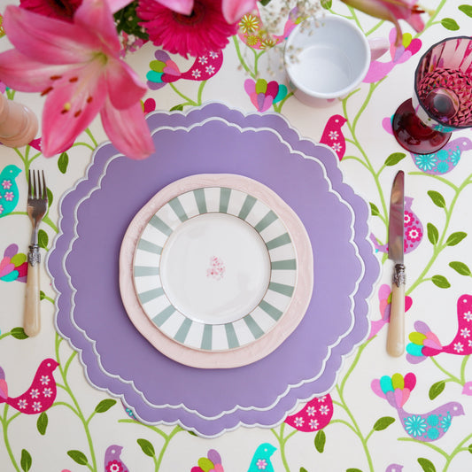 Scarlett Purple Round Faux Leather Placemat – Handcrafted luxury from eco-friendly vegan faux leather, featuring sophisticated white-purple embroidery, double-layered durability, and stain-resistant elegance. Exclusively by PNR Decor.