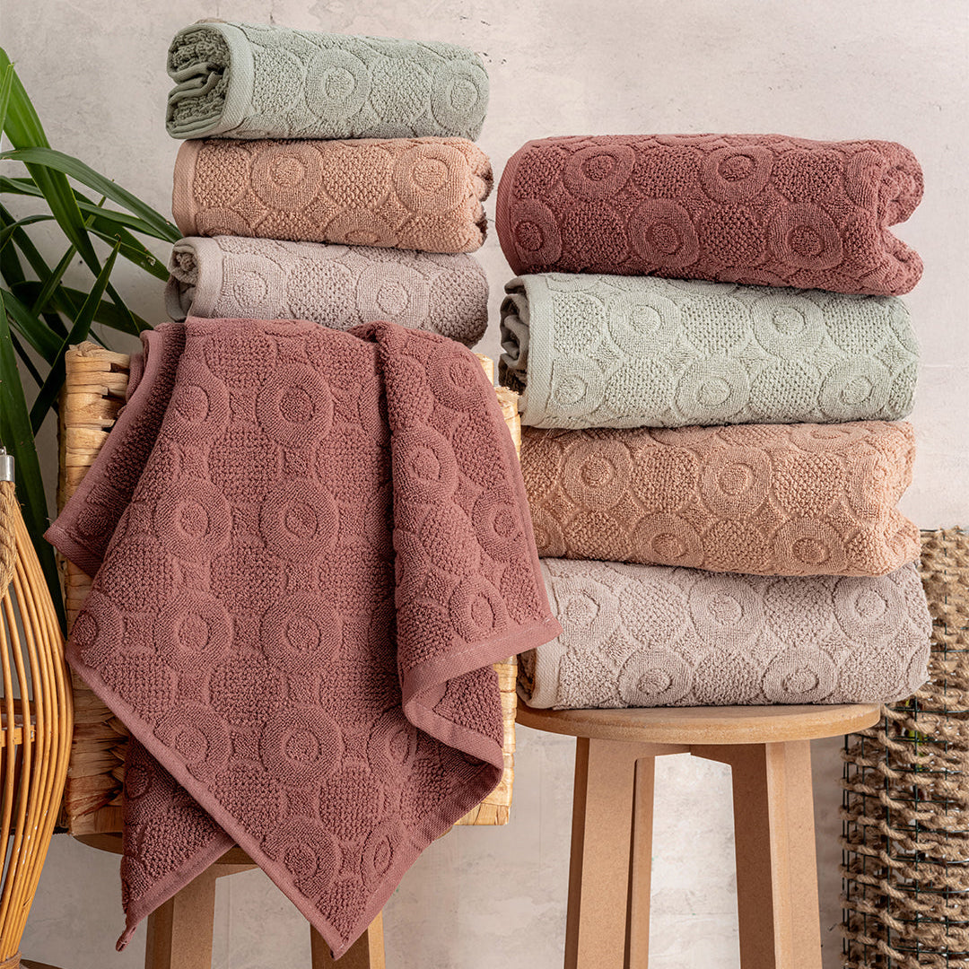 Close up of Serava Domino towels showing embroidered detail and soft fabric texture by PNRDECOR ship from USA