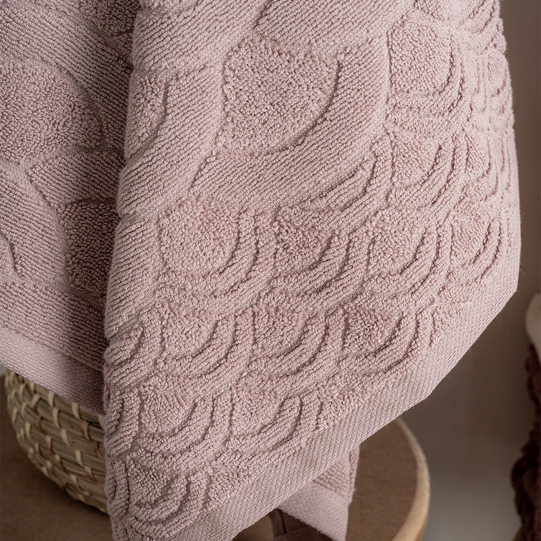 Close up of Serava Olga towels showing embroidered detail and soft fabric texture by PNRDECOR ship from USA