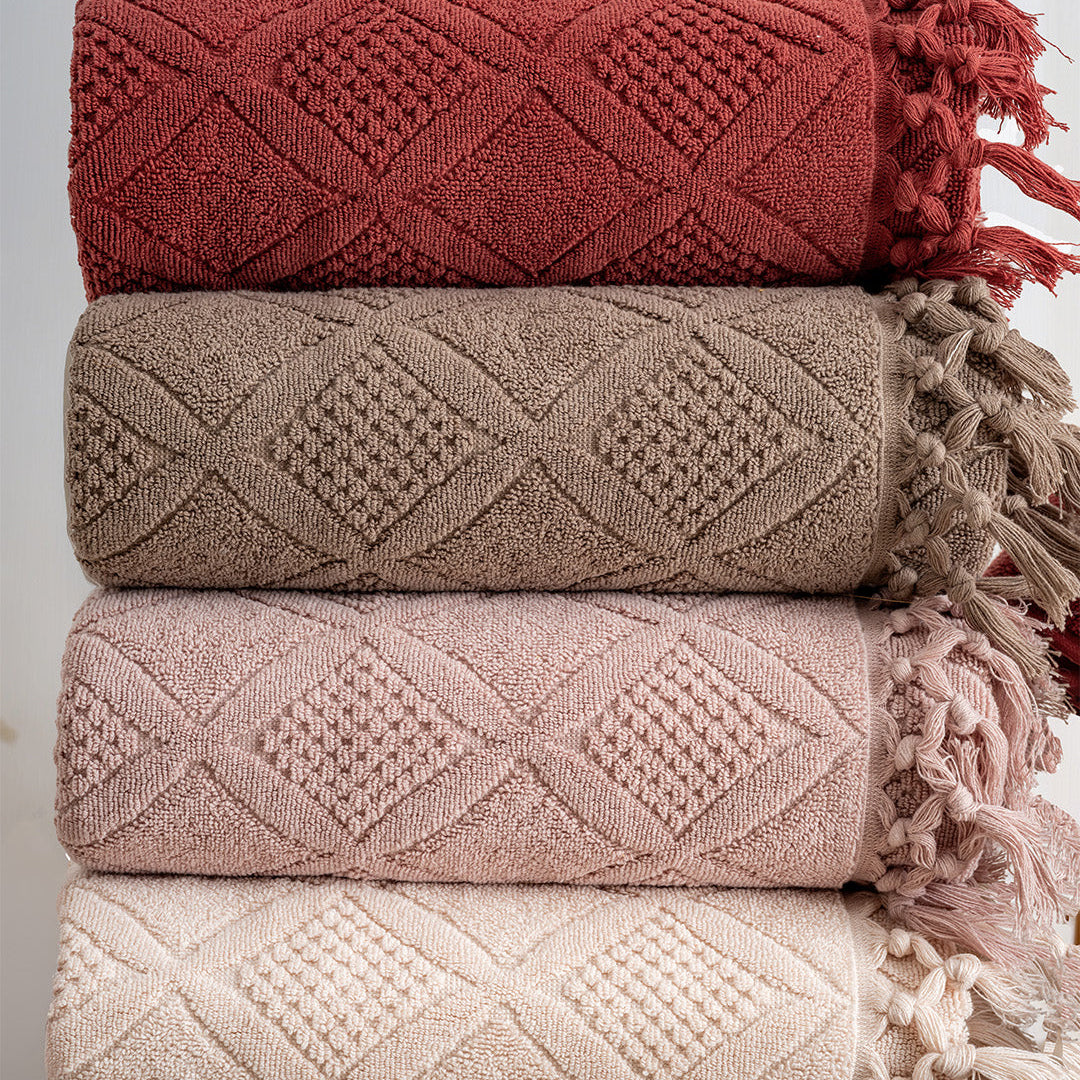 Close up of Serava Porto towels showing embroidered detail and soft fabric texture by PNRDECOR ship from USA