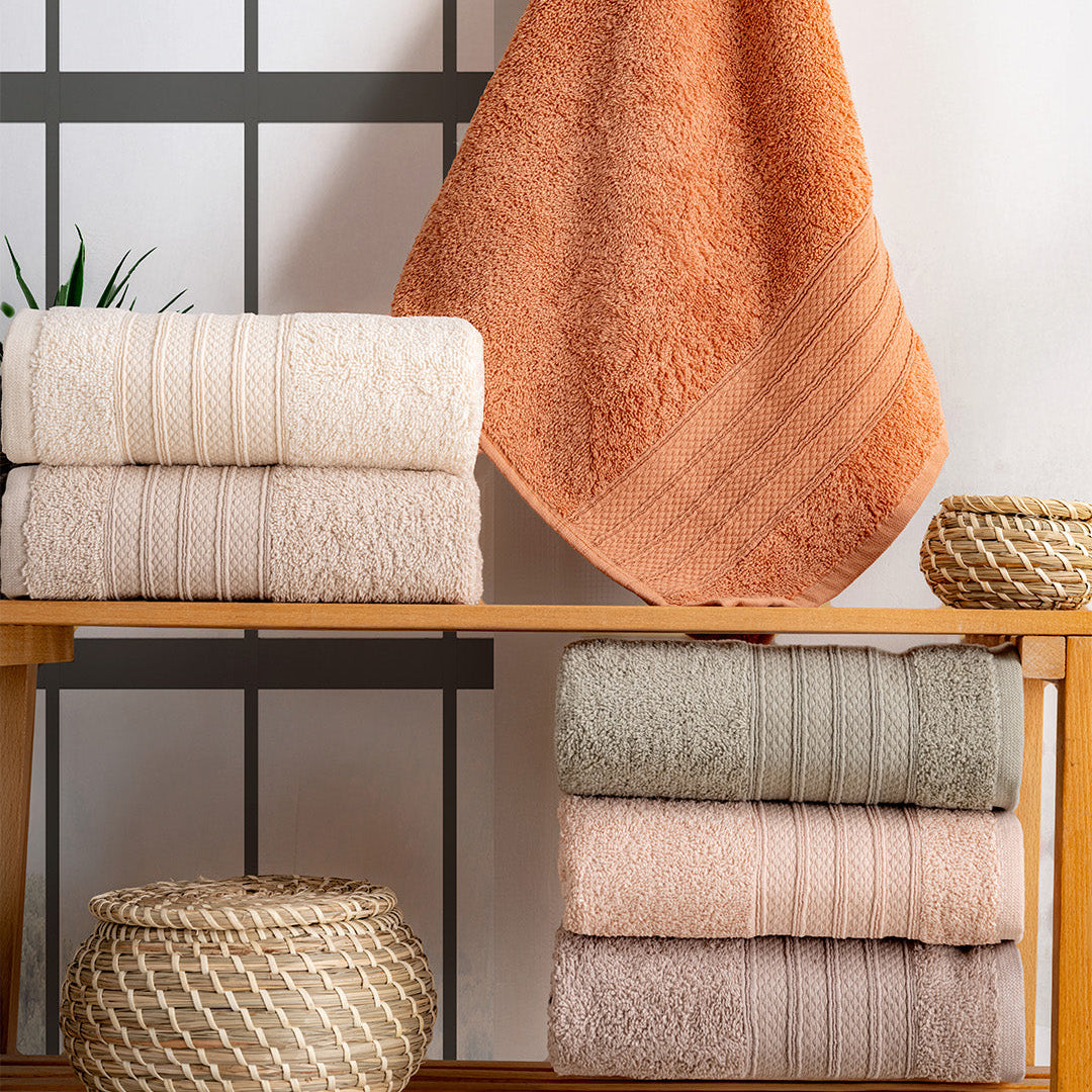 Close up of Silvra towels showing embroidered detail and soft fabric texture by PNRDECOR ship from USA