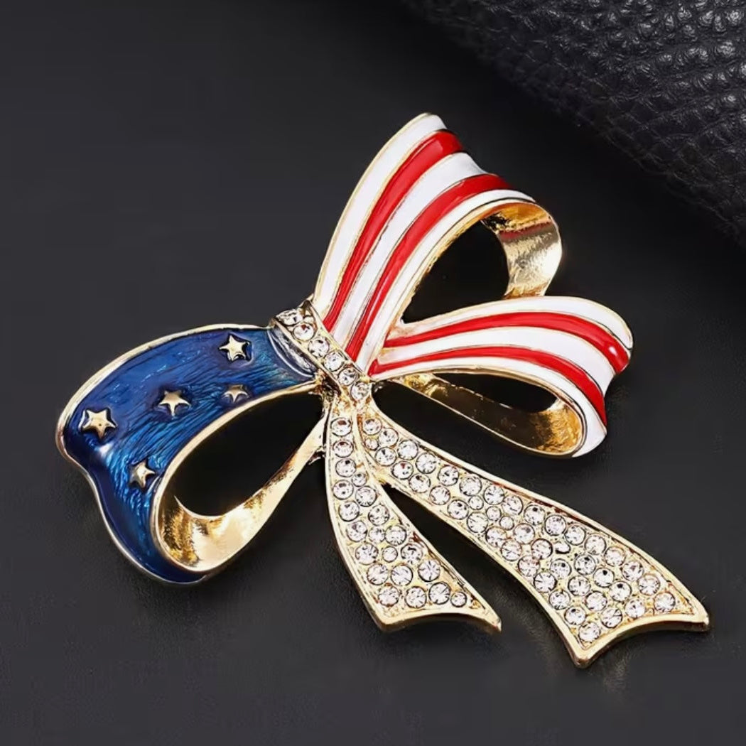 American flag bow crystal brooch styled on a blazer lapel or coat for a patriotic outfit, Ship From USA, by Pnr Decor.
