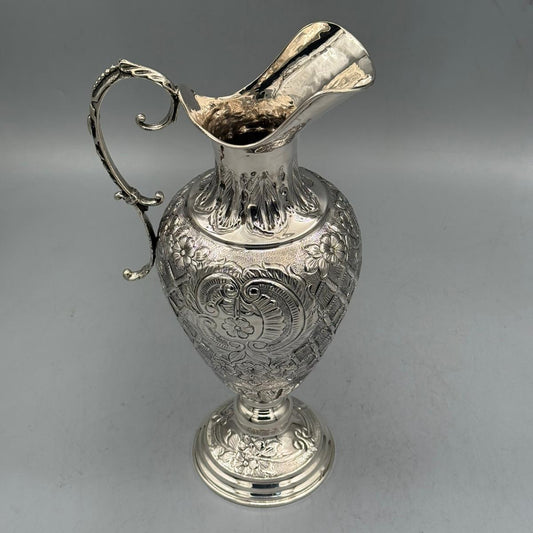 Front view of antique silver ewer with intricate floral chasing by PNR Decor ship from USA