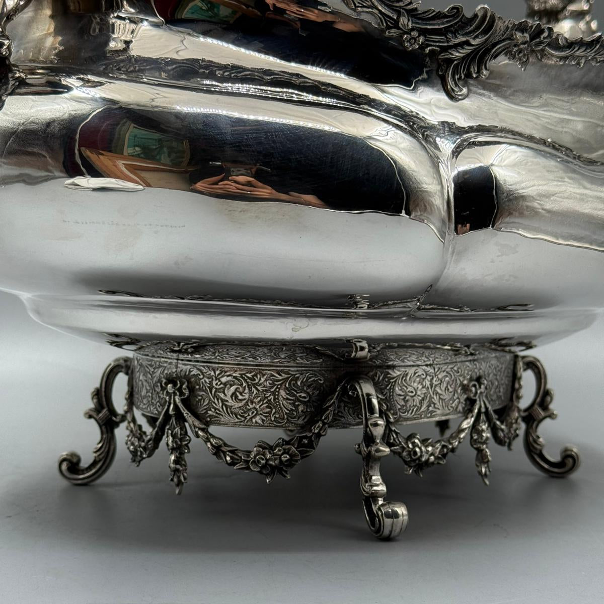 Decorative floral base of antique silver gondola centerpiece