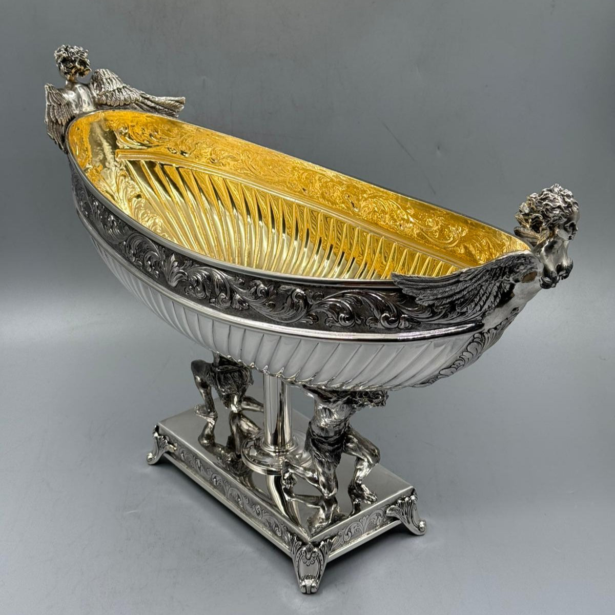 Antique silver Hercules gondola centerpiece with gilded interior, side view