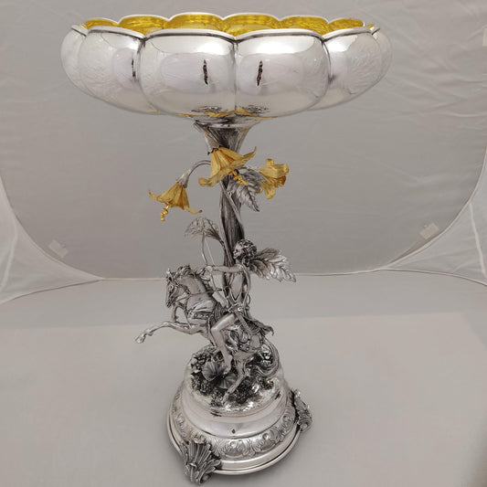 Antique silver centerpiece with horse rider and gilded floral bowl