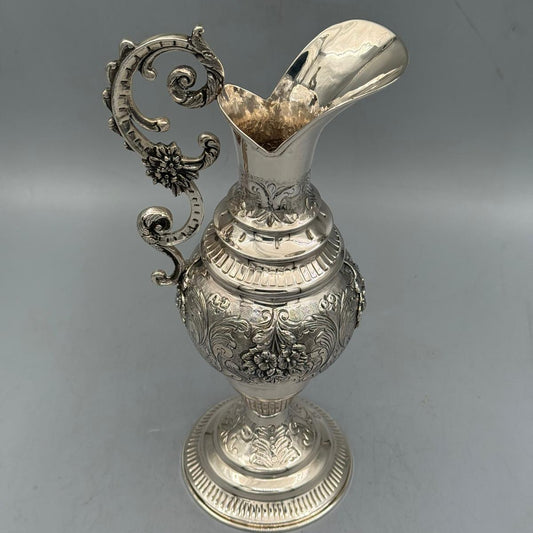 Front view of highly ornate antique silver ewer with floral relief by PNR Decor ship from USA