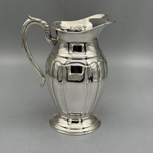Front view of antique silver pitcher with wide panel fluted body by PNR Decor ship from USA