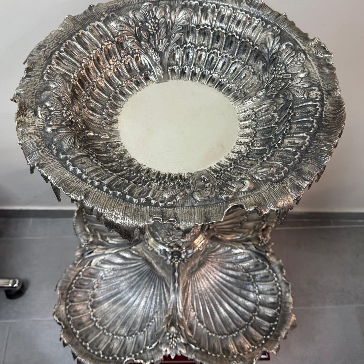 Top view of antique silver centerpiece with detailed shell form bowl