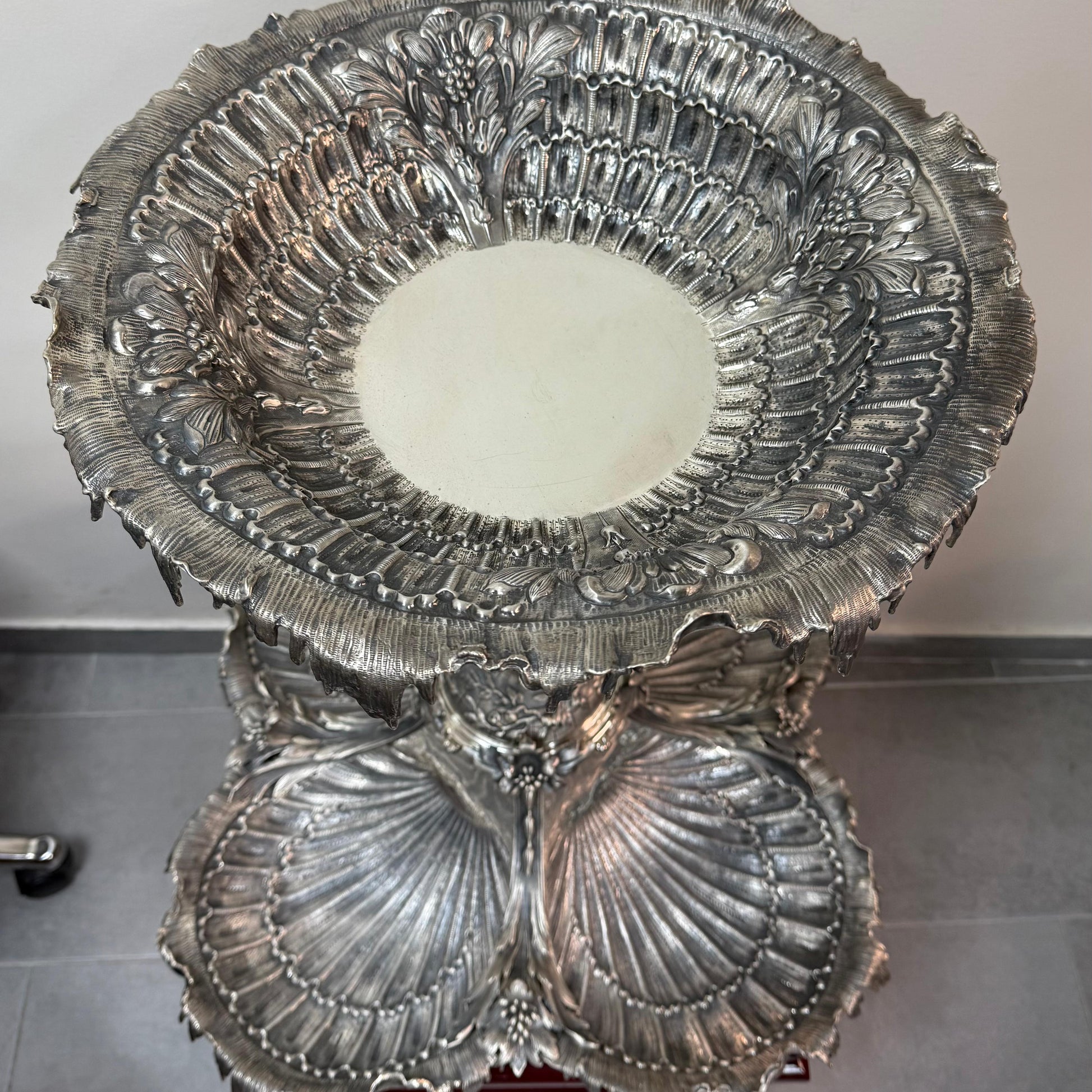 Top view of antique silver centerpiece with detailed shell form bowl