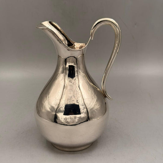 Front view of smooth antique silver pitcher with bulbous body by PNR Decor ship from USA