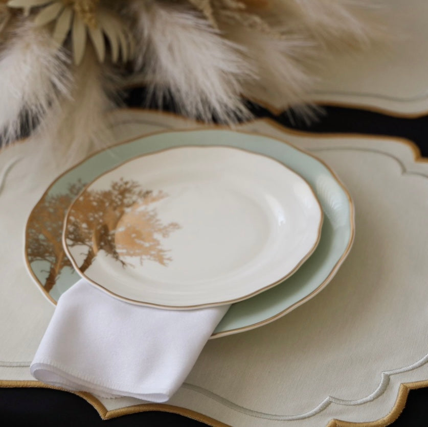Flatlay view of the Arista Cream Fabric Placemat with embroidered detailing – perfect for elegant dining setup