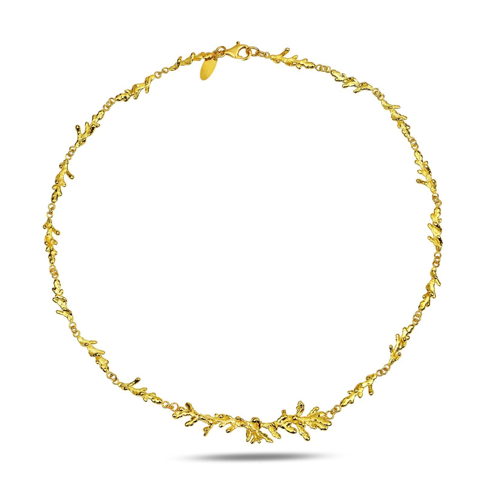 Front view of the continuous pine branch collar necklace, an elegant piece of woodland-inspired jewelry symbolizing resilience and eternal life.