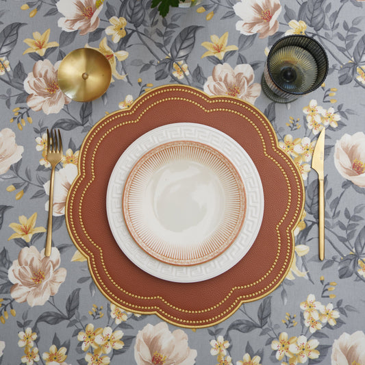Nurture Brown Gold Round Vegan Leather Placemat – crafted for timeless elegance, this piece features cruelty-free materials, embroidered detail, and an effortless wipe-clean surface.