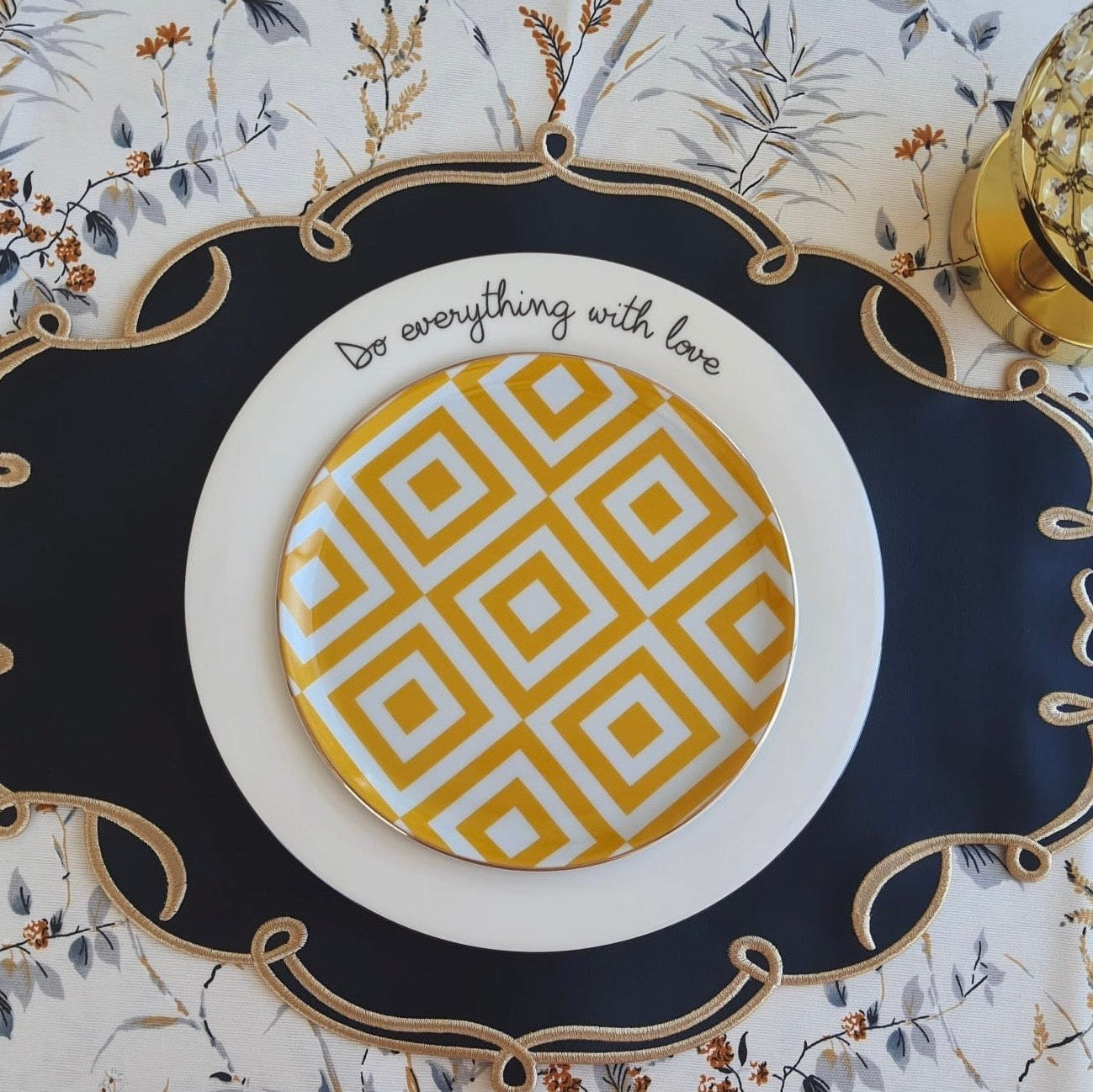 Celestia black oval faux leather placemat napkin and coaster set styled for a holiday table by PNRDECOR ship from USA