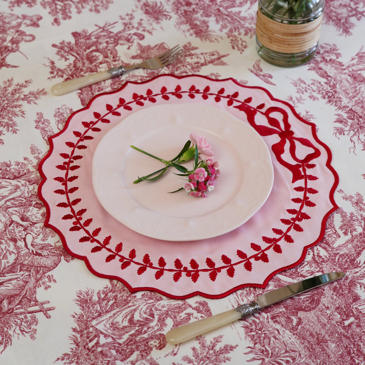 Elegant Champagne Pink Cotton Blend Round Placemat displayed on a dining table with scalloped embroidery edges, adding luxury and warmth to modern table decor. Handmade and stain-resistant design perfect for daily use or celebration