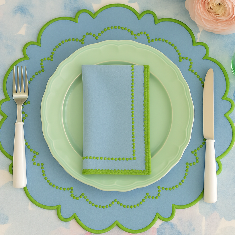 Top-down view of Harmony placemat placed beside matching tableware