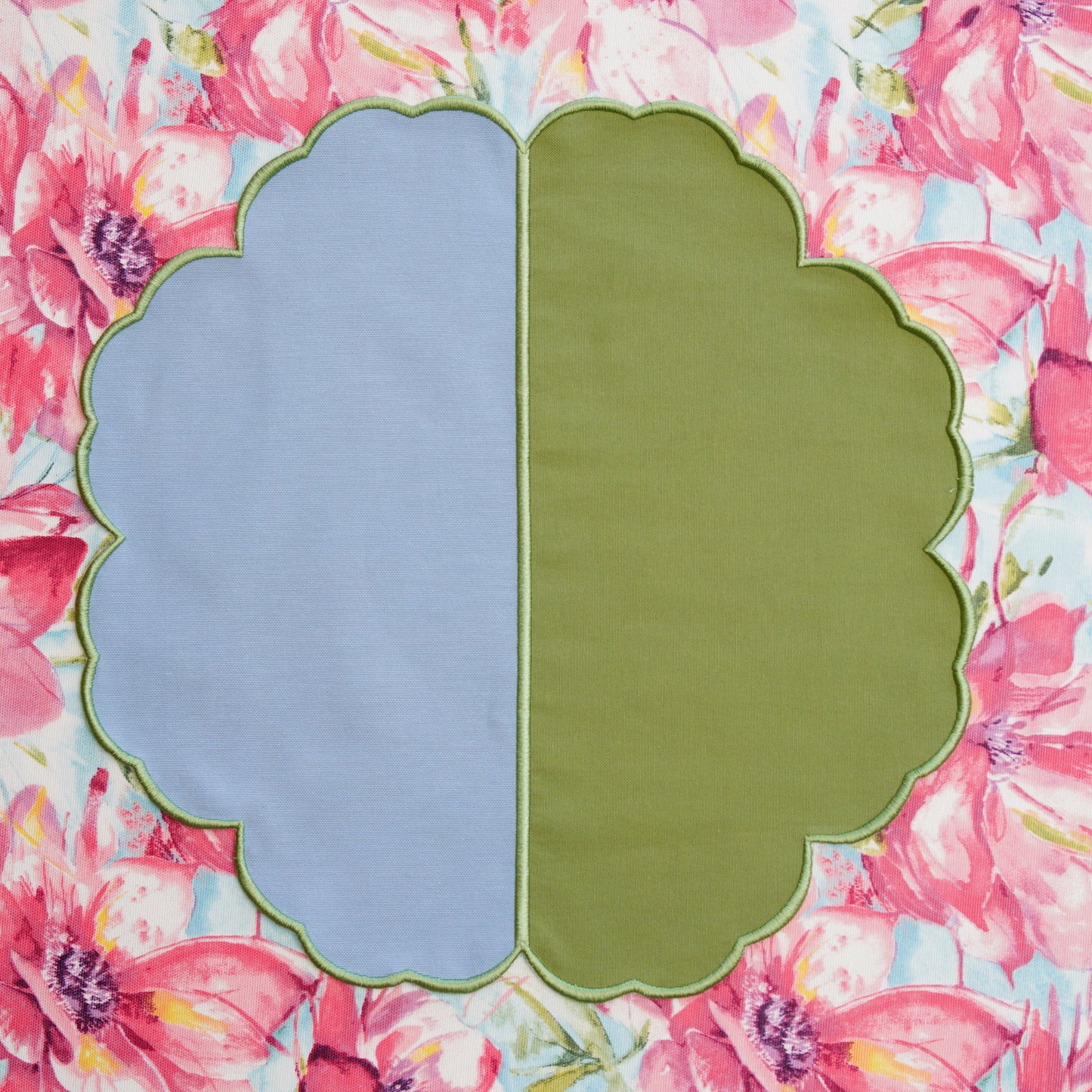 Scalloped fabric placemat displayed in a minimalist table