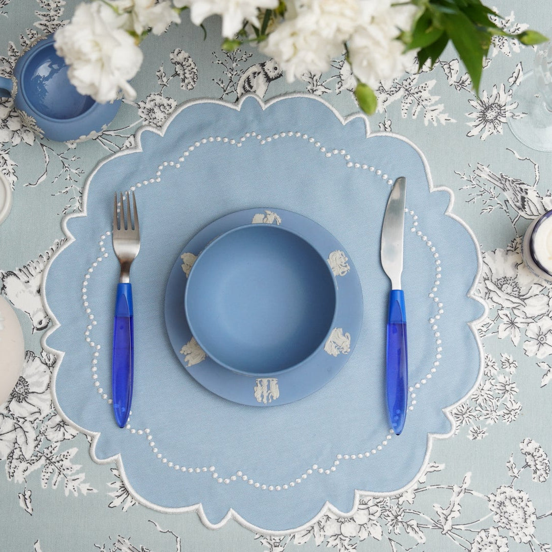 Wedding table decor styled with a Harmony scalloped cotton placemat