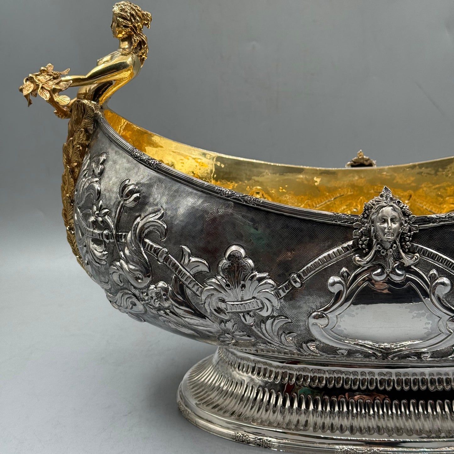 Close up detail of the gold gilt mermaid nymph figure handle on silver centerpiece by PNR Decor ship from USA