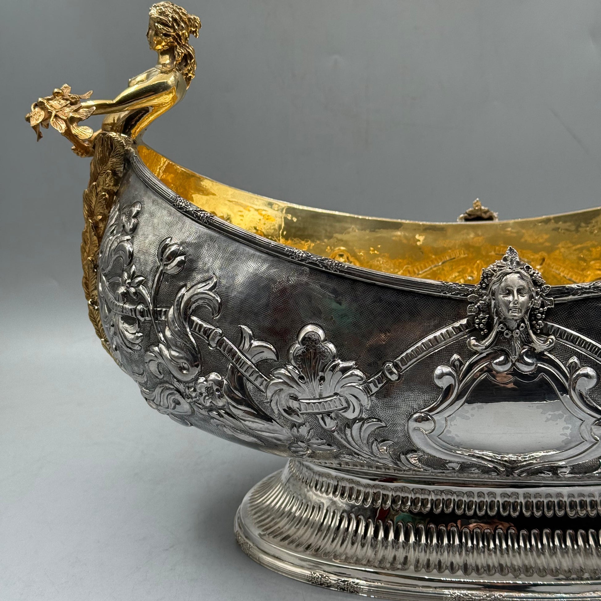 Close up detail of the gold gilt mermaid nymph figure handle on silver centerpiece by PNR Decor ship from USA
