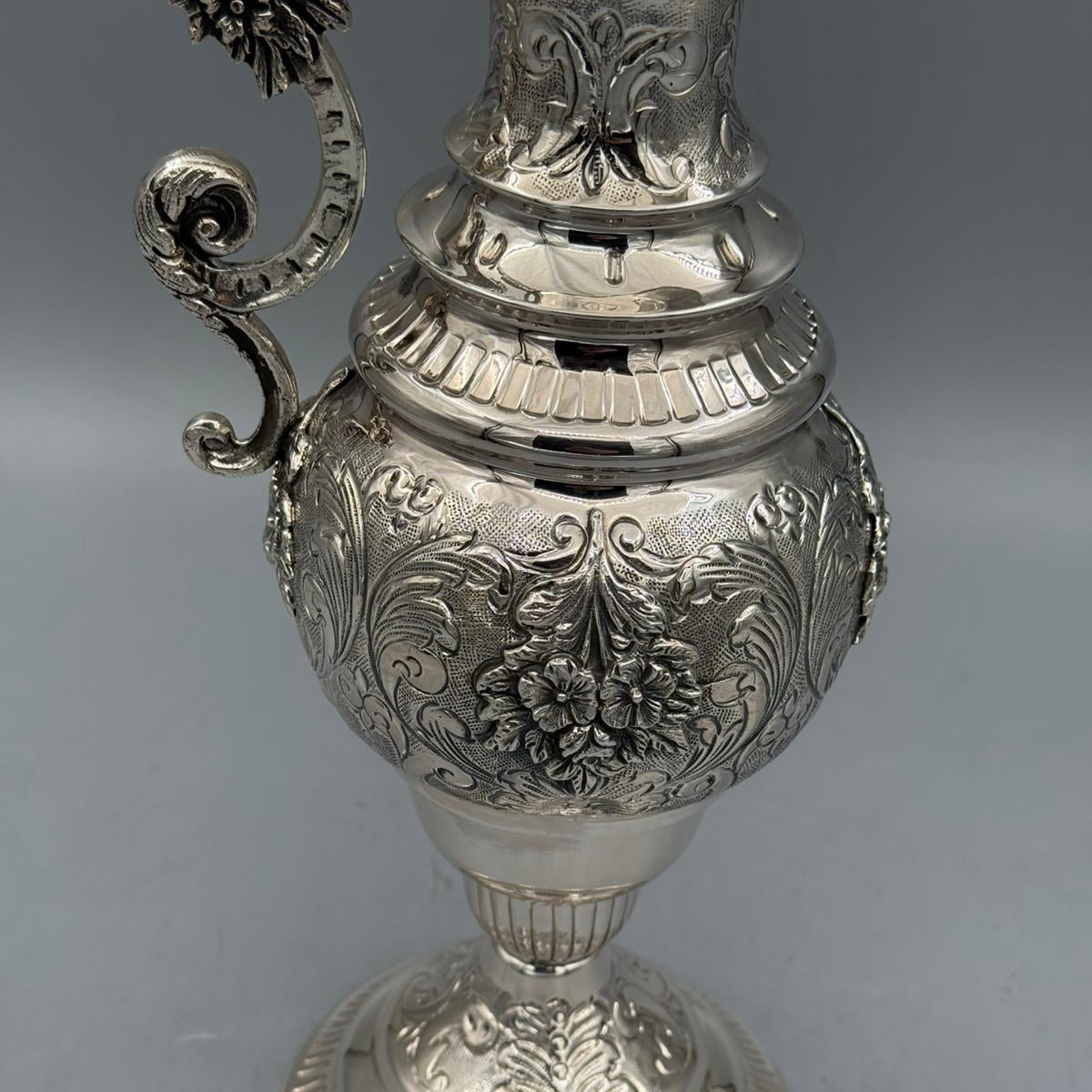 Close up of heavy floral repousse work and gadrooned collar on silver jug by PNR Decor ship from USA