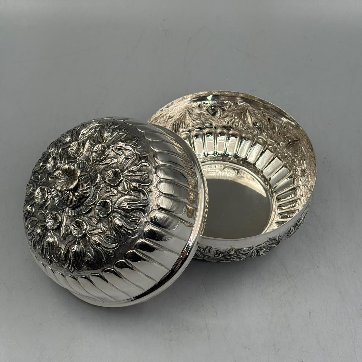 Handcrafted 900 sterling silver ribbed bonbonniere with a floral engraved lid shown open, made in Istanbul Grand Bazaar.