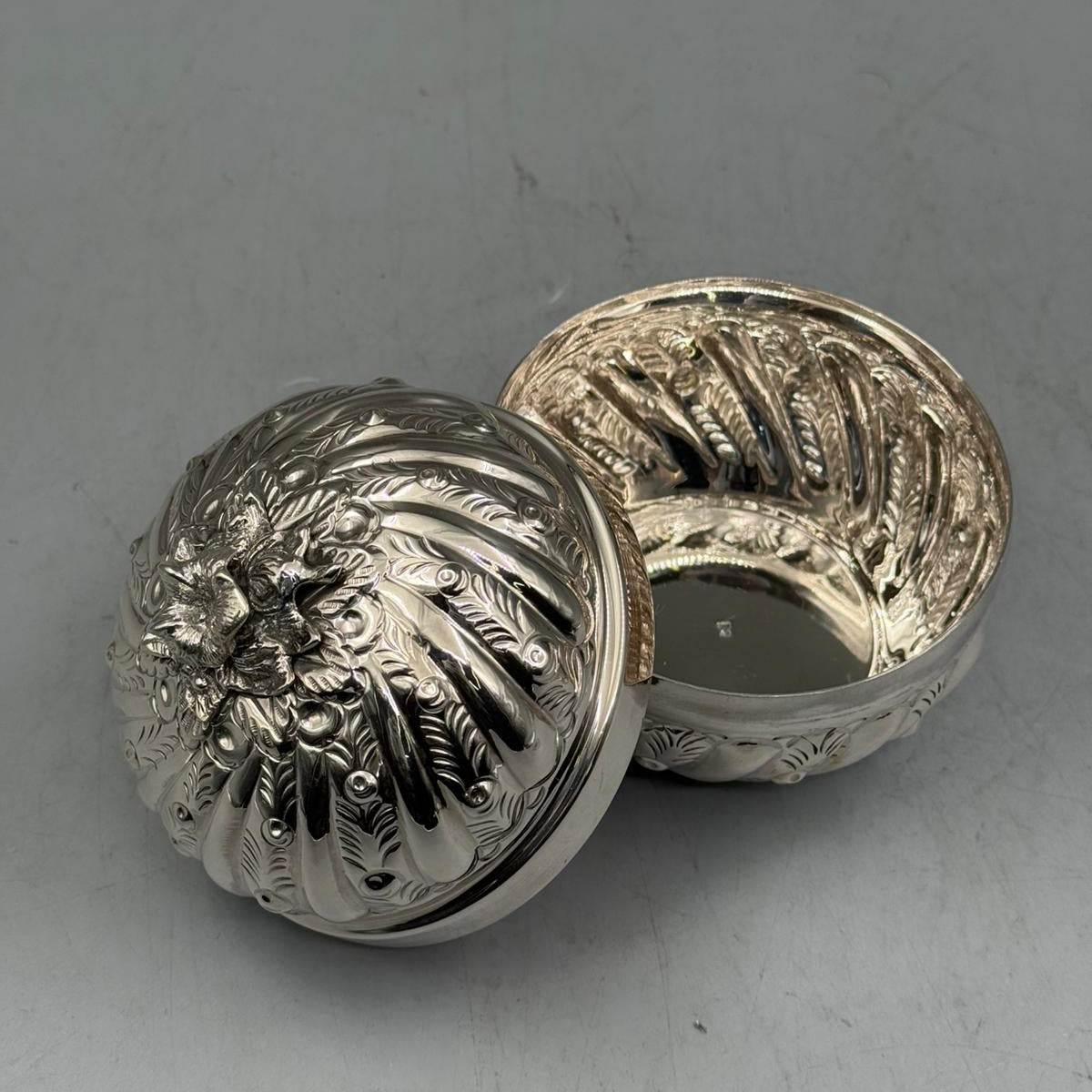 Handcrafted 900 sterling silver petite bonbonniere with row-inlaid swirled design shown open, made in Istanbul Grand Bazaar.