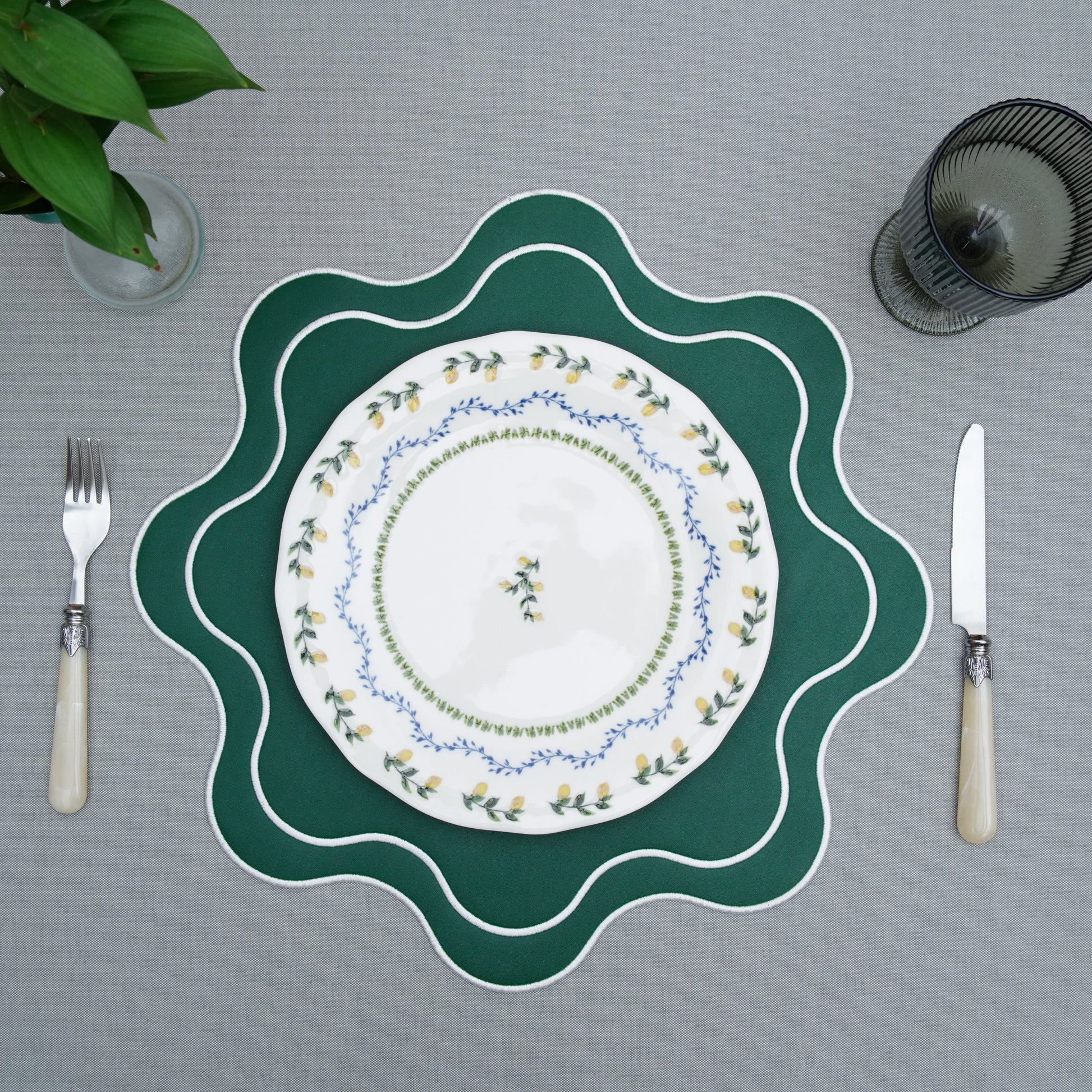 Close-up of the gray tablecloth fabric showing a subtle woven texture and clean, minimal look